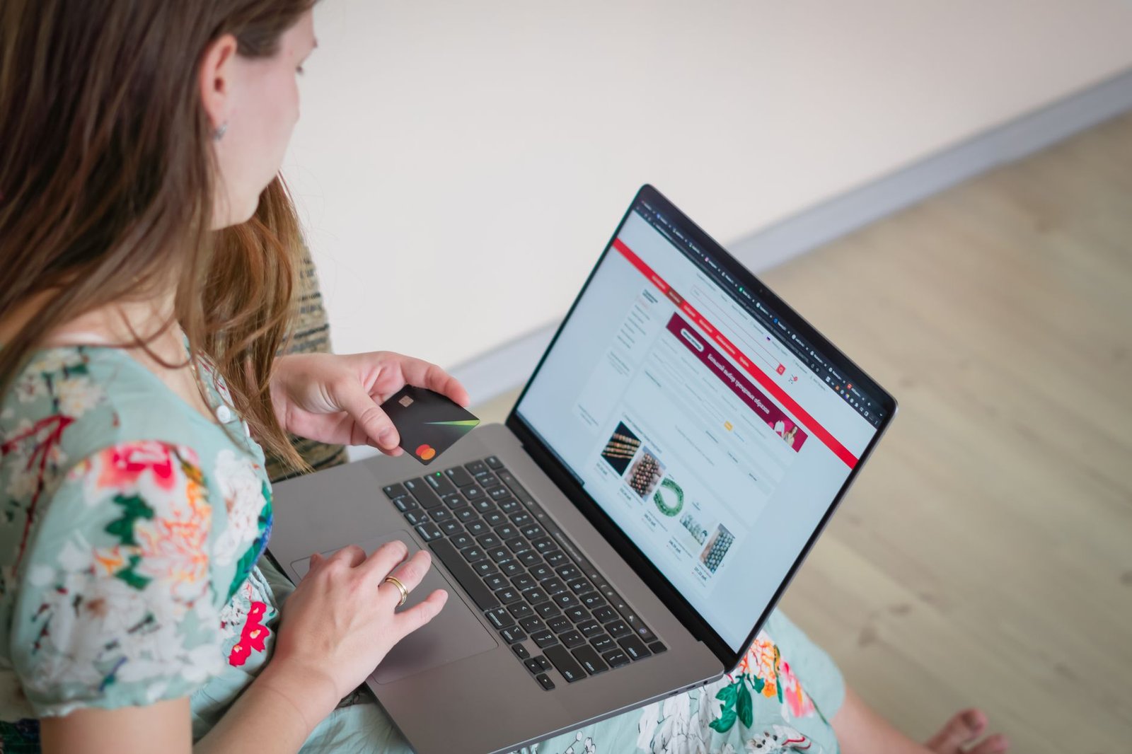 A shopper comparing rising 2026 tech prices online.