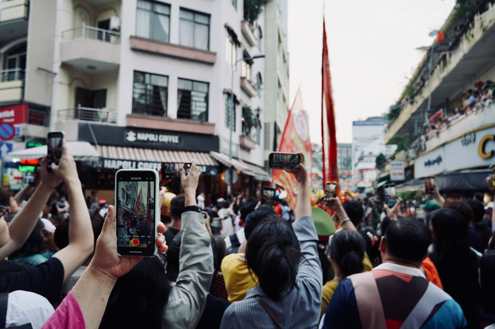 A crowded street where network congestion can briefly slow a cheap carrier.
