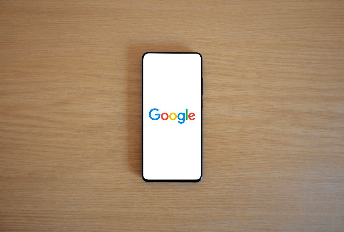 A modern Google Android phone on a desk, representing the Pixel 10a