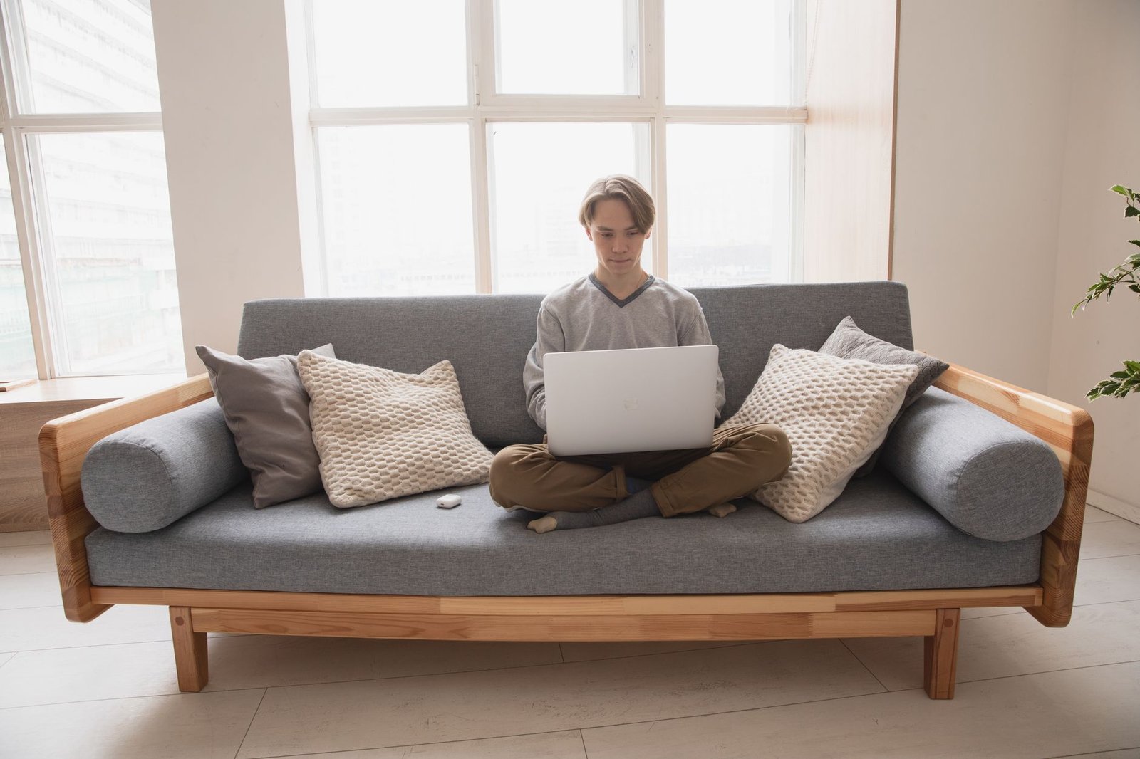 Person checking their real internet speed on a laptop at home