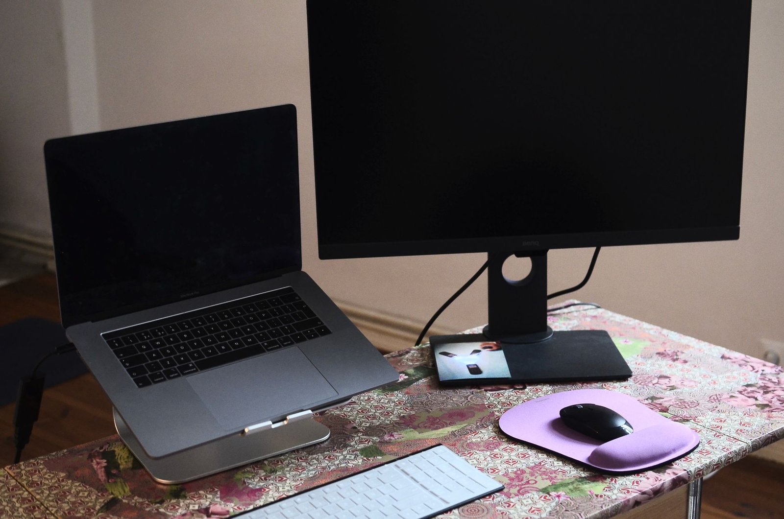 Laptop raised on a stand for better summer airflow