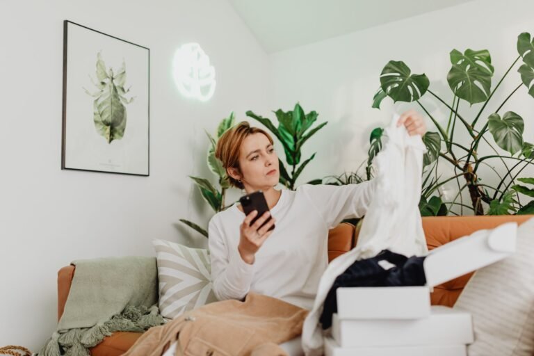 Shopper using a phone to spot fake Amazon reviews on a product listing.