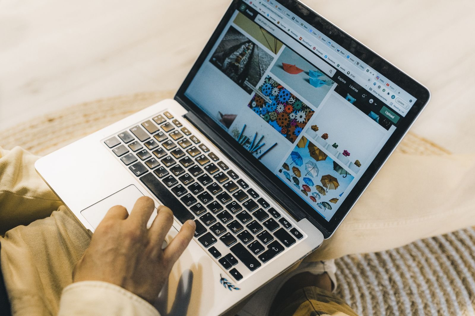 Using a laptop to run a reverse image search and check a photo before sharing