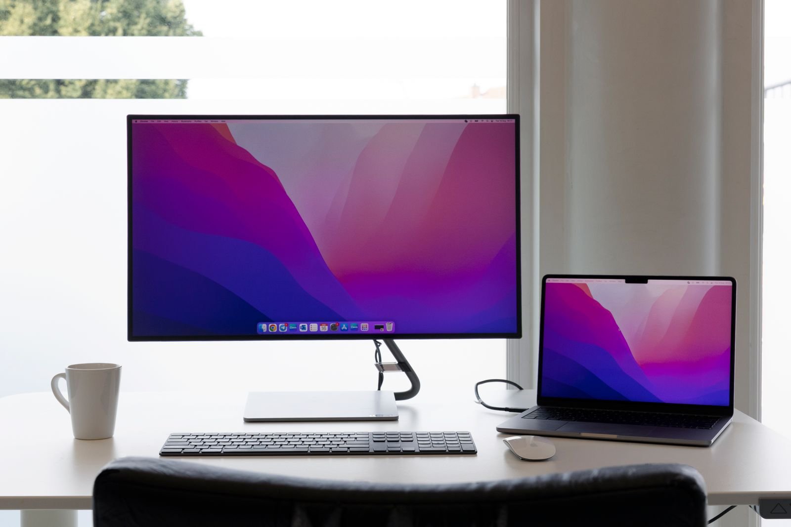 A laptop and monitor setup showing student laptop options compared