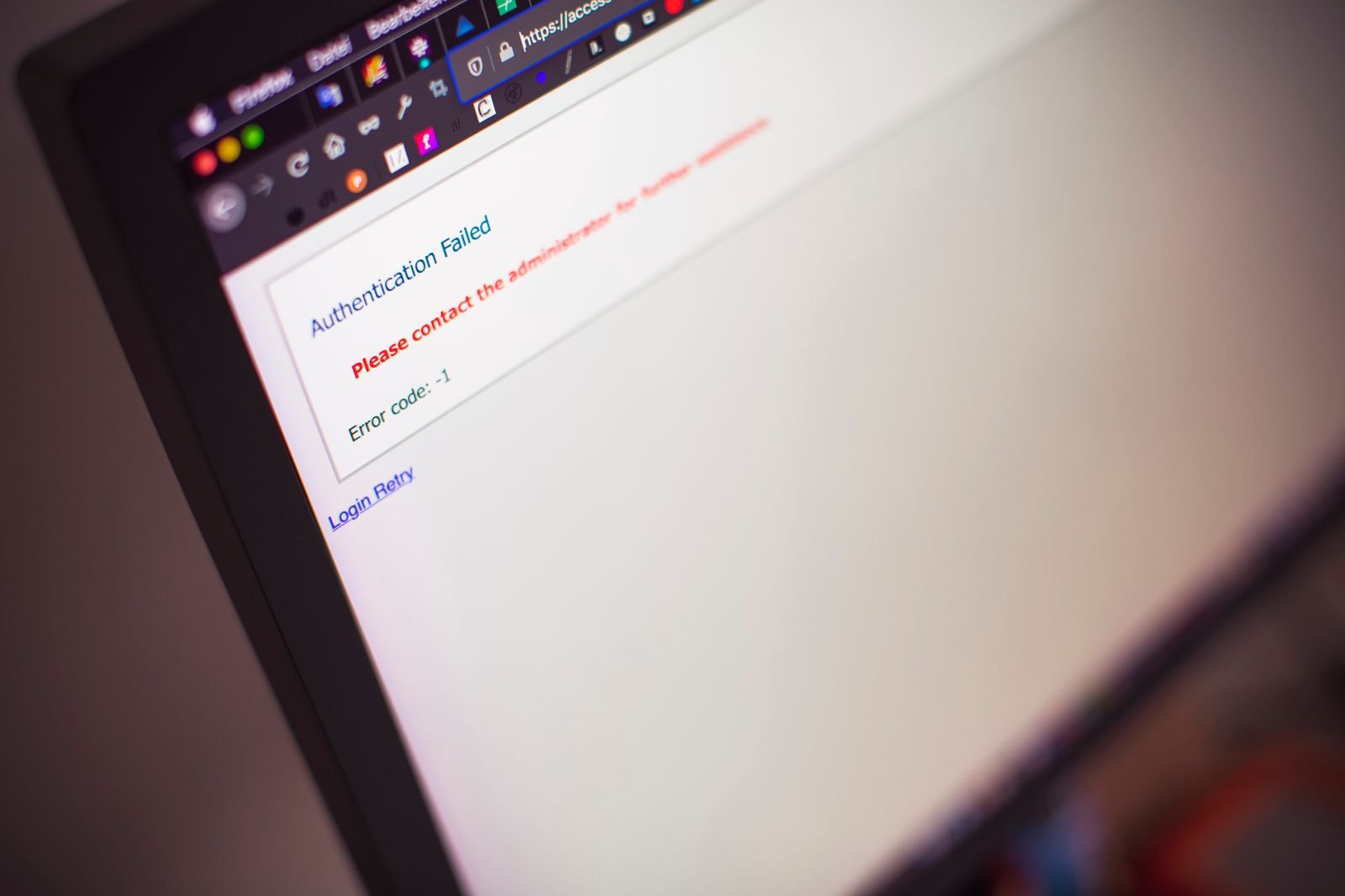 Laptop screen showing a suspicious public WiFi login page asking for a password
