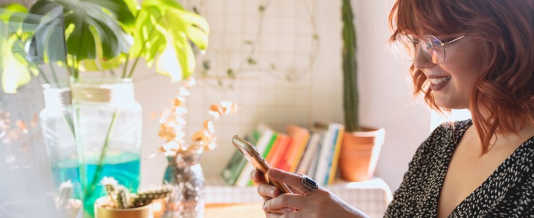 How to set up passkeys: a woman signing in on her phone with a passkey instead of a password