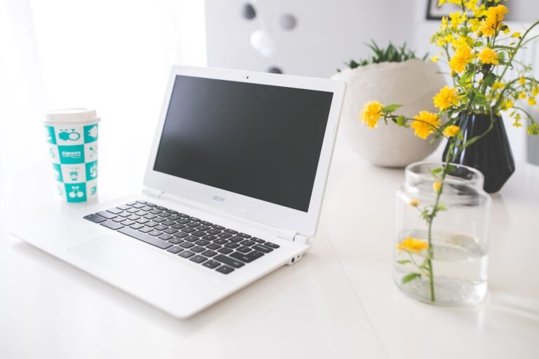 Bright open laptop on a sunny desk ready for a Labor Day 2026 purchase decision
