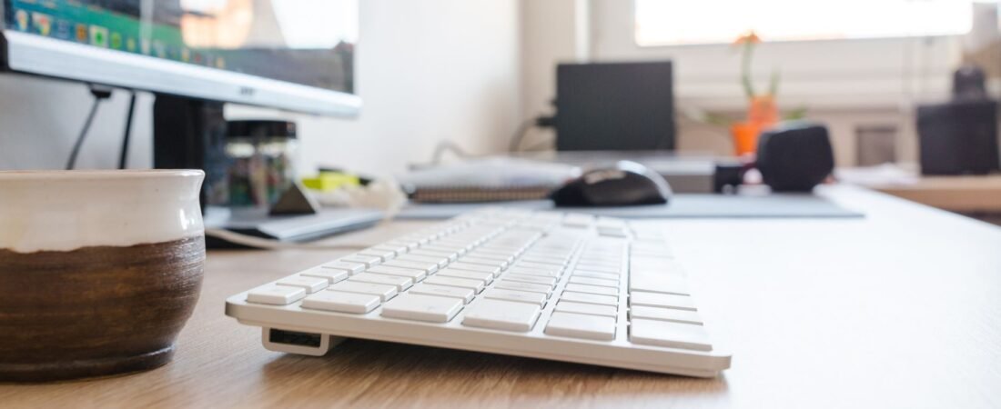 Windows 10 still safe in 2026: a clean modern desktop PC on a home office desk