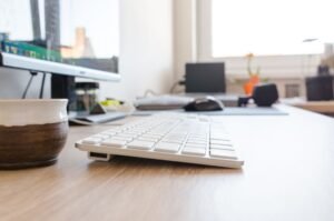 Windows 10 still safe in 2026: a clean modern desktop PC on a home office desk