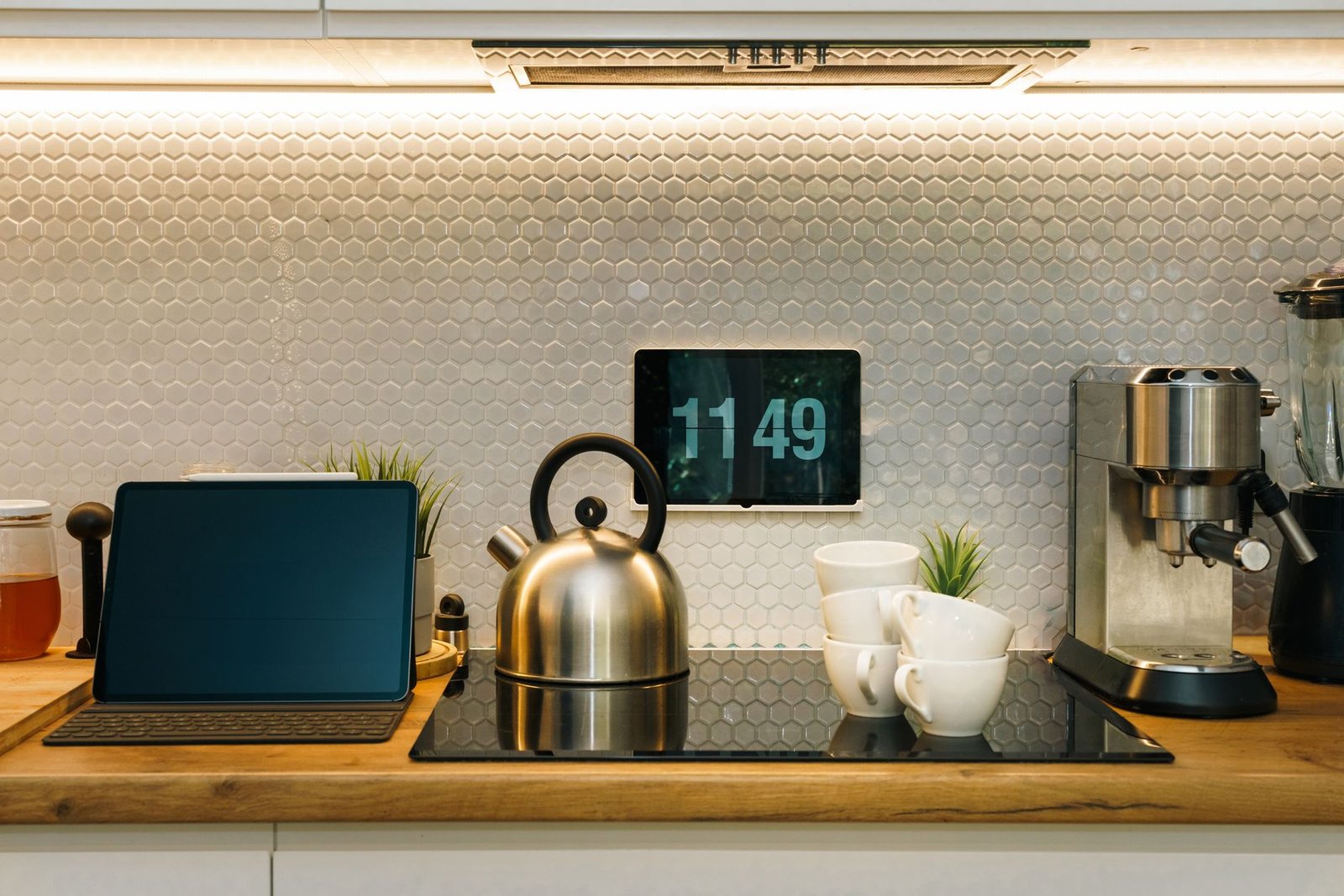 Is Alexa+ worth it: a smart display and tablet on a modern kitchen counter.