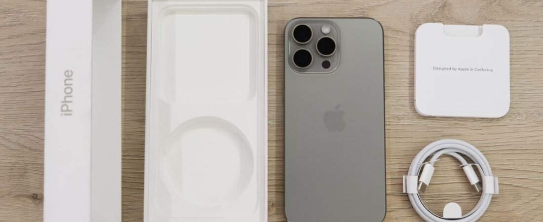 Apple iPhone box, cable and a Pro model laid out for the fall 2026 iPhone launch