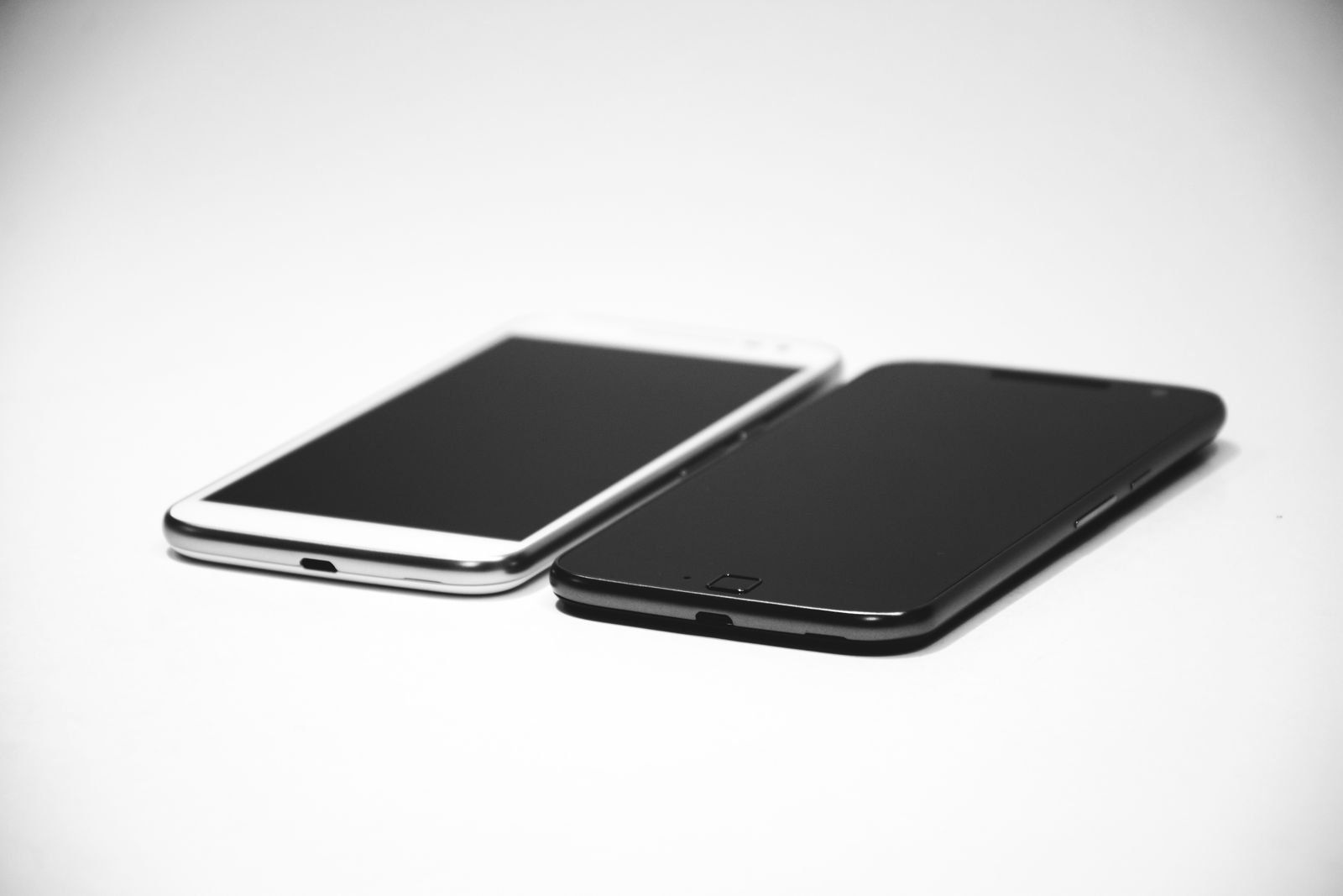 An older iPhone beside a newer one, ready to erase the old phone safely