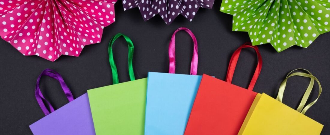 Colorful flat-lay of shopping bags for Prime Big Deal Days 2026